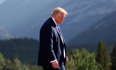 President Donald Trump leaves after a photo session during the G7 Summit