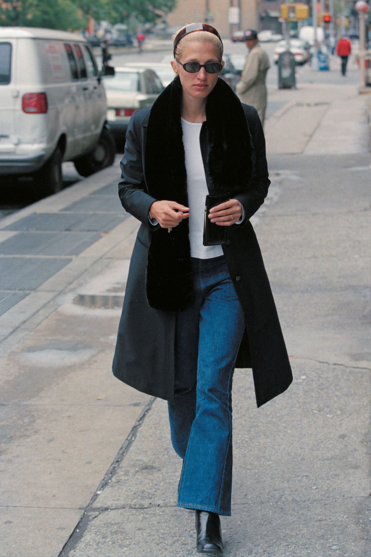 <i>Lawrence Schwartzwald/Sygma/Getty Images via CNN Newsource</i><br/>A tortoise shell headband and kick-flare jeans are among the key elements of Bessette-Kennedy's signature look.