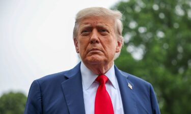 U.S. President Donald Trump stops and talks to the media before he boards Marine One on the South Lawn at the White House on June 15