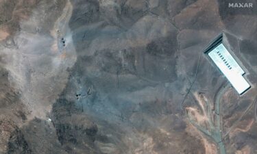 This satellite image provided by Maxar Technologies shows a closer view of craters and ash on a ridge at Fordow enrichment facility in Iran after US strikes