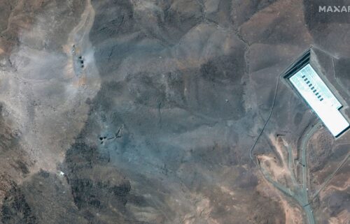 This satellite image provided by Maxar Technologies shows a closer view of craters and ash on a ridge at Fordow enrichment facility in Iran after US strikes