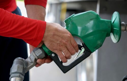 Arley Perez pumps diesel fuel into his truck at a Shell station on April 10