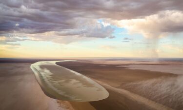 A photo of the Kalamurina Wildlife Sanctuary taken in 2018 shows floodwaters from north-west Queensland flowing into the area