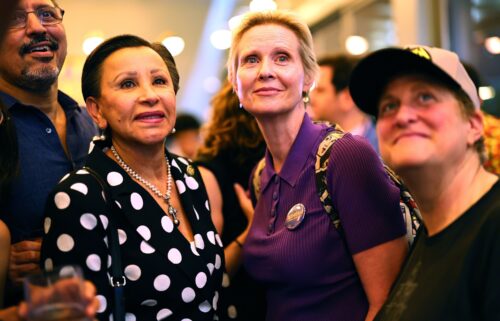 US Rep Nydia Velazquez of New York (L) and actress Cynthia Nixon (R) watch election returns during an election night gathering for New York mayoral candidate