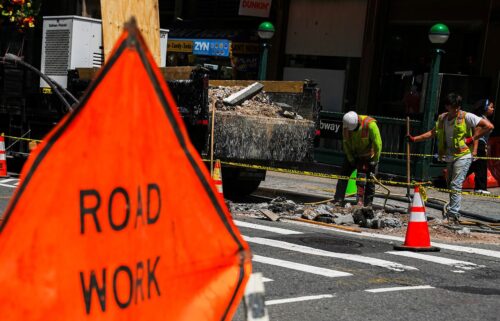 Construction workers work as a heat advisory continues in New York City on June 23.