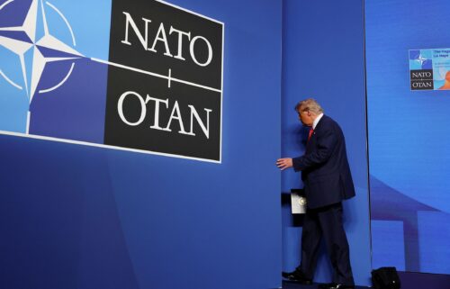 President Donald Trump leaves following a press conference at the NATO summit in The Hague