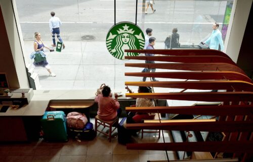 Customers at a Starbucks location in New York in August 2023. The company is trying to lure back customers looking to sit and enjoy a coffee drink.