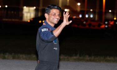 Shubhanshu Shukla waves before departing for a launch to the International Space Station at the Kennedy Space Center in Cape Canaveral