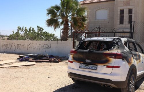 Israeli settlers set fire to homes and vehicles in an attack Palestinian officials say killed three people.