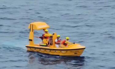 The Disney Dream rescue team rescued the two passengers who fell overboard.