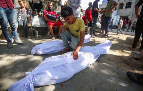 A mourner attends the funeral of Palestinians killed in an Israeli airstrike on Al-Baqa cafeteria.