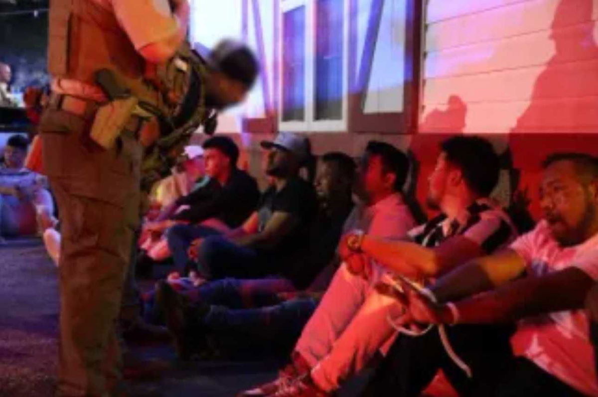 <i>U.S. Department of Homeland Security/WYFF via CNN Newsource</i><br/>The South Carolina Law Enforcement Division has charged two men after an Immigration and Customs Enforcement raid at a