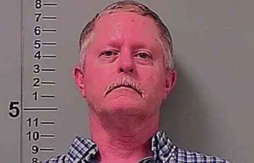 A man has been charged after a Spanish-speaking woman had a gun pulled on her and was told to “go back to Mexico” while trying to deliver an order from Walmart.