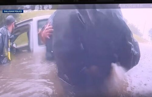 Bodycam video showed the rescue of a driver from a nearly submerged truck under a railroad bridge in Sallisaw.
