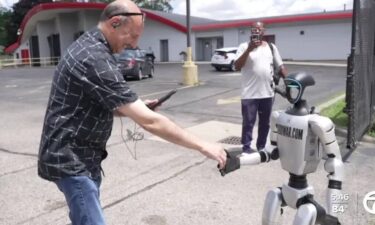 A human-sized robot casually walking down 7 Mile Road in Detroit has captured viral attention online and stopped pedestrians in their tracks.