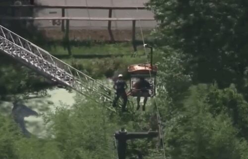 Firefighters were seen helping over 30 passengers evacuate a stalled aerial ride over Southwick's Zoo in Mendon