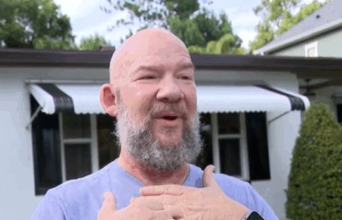 Mark Sunderland says a downed line on an Orlando Street wrapped around his neck and pulled him off his Vespa.
