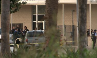 Police work at the scene of the shooting in McAllen