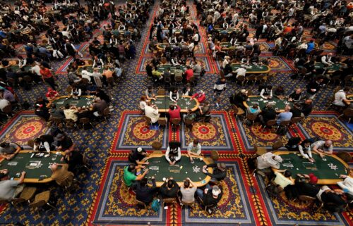 Players fill tables during the main event at the World Series of Poker in Las Vegas on July 6