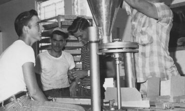 A photo from 1960 shows US workers preparing sterile flies for dispersal.
