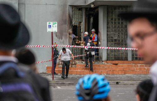 Members of the synagogue recover items from the Adass Israel Synagogue on December 6