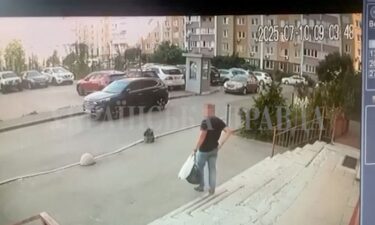 A CCTV footage shows a Security Service of Ukraine (SBU) officer walking down the stairs moments before he was shot in Kyiv