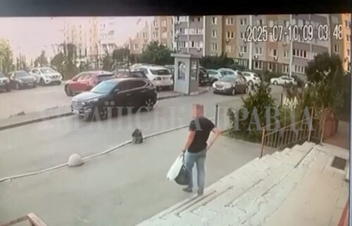 A CCTV footage shows a Security Service of Ukraine (SBU) officer walking down the stairs moments before he was shot in Kyiv