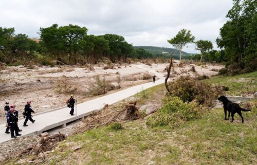 Members of Orange County Task Force One search for missing flood victims in Kerrville