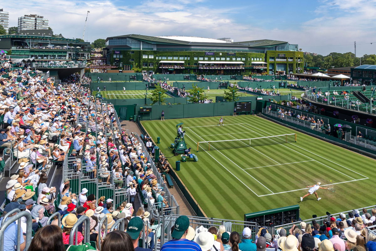 <i>Tim Clayton/Corbis Sport/Getty Images via CNN Newsource</i><br/>Spectators pack out the stands at Wimbledon