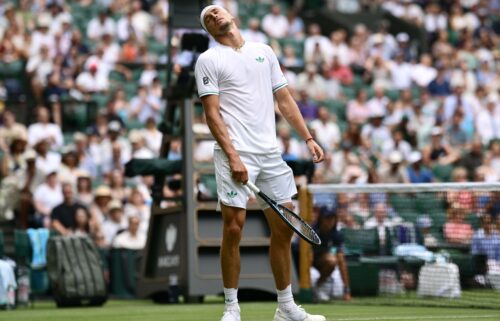 Third seed Alexander Zverev reacts during his defeat against Arthur Rinderknech at Wimbledon.