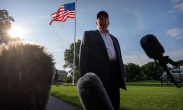 President Donald Trump speaks to the media before walking across the South Lawn of the White House earlier this week.