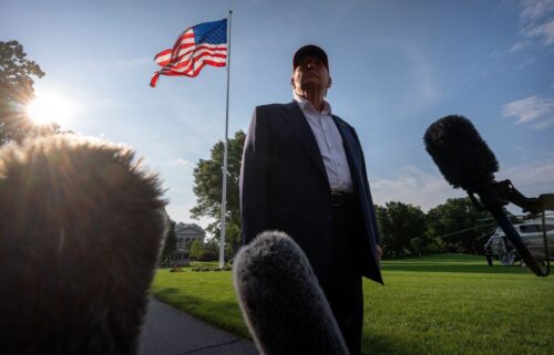 President Donald Trump speaks to the media before walking across the South Lawn of the White House earlier this week.