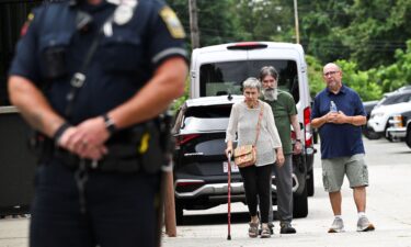 Residents of Gabriel House Assisted Living Facility make their way to an emergency shelter set up at the Timao Center