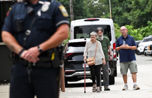 Residents of Gabriel House Assisted Living Facility make their way to an emergency shelter set up at the Timao Center
