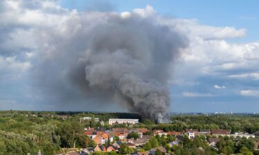 Smoke billows above the site of the Tomorrowland electronic music festival in Boom