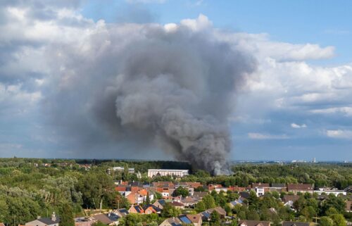 Smoke billows above the site of the Tomorrowland electronic music festival in Boom