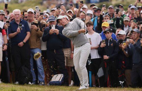 Rory McIlroy shot 1-under par to finish the first round tied for 20th in his birthplace of Northern Ireland.