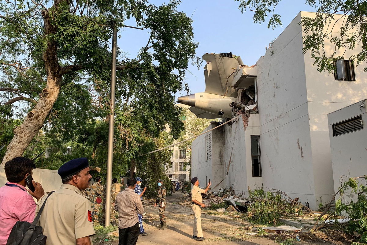 <i>Sam Panthaky/AFP/Getty Images via CNN Newsource</i><br/>The back of Air India flight 171 is pictured at the site after it crashed in a residential area near the airport in Ahmedabad on June 12.
