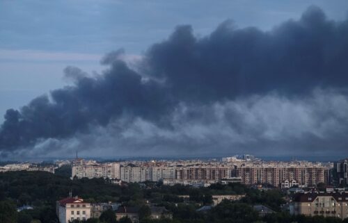 Smoke is seen in the city after a Russian drone and missile strike
