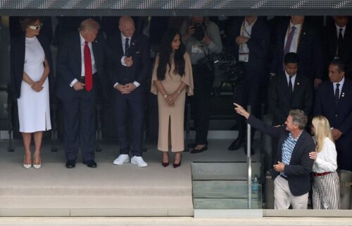 President Donald Trump gives a thumbs-up to Attorney General Pam Bondi