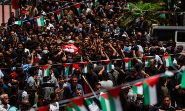 People carry the body of Saif Musallet during his funeral near Ramallah