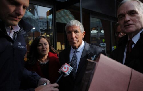 William "Rick" Singer departs after being sentenced at the federal courthouse in Boston