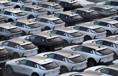 US automaker General Motors' Cadillac vehicles are lined up at a vehicle storage yard at an industrial port