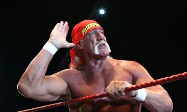 Hulk Hogan gestures to the audience during his Hulkamania Tour in 2009.