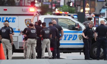 Police respond to an incident in midtown Manhattan on July 28.