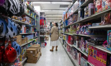 People shop at a Manhattan retail store.