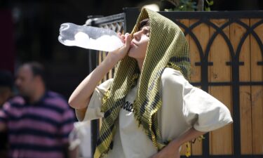 A resident tries to cool off in Tehran