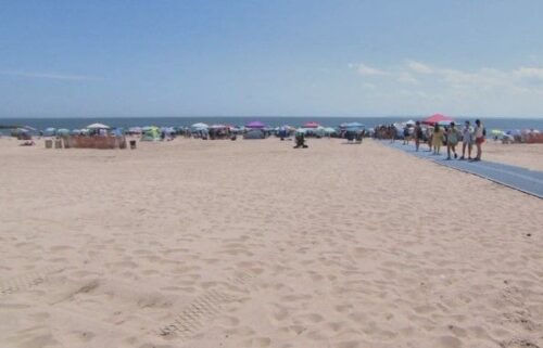 A woman says she was raped on a Coney Island beach over the Fourth of July weekend and onlookers recorded videos instead of stopping to help.