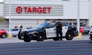 Police block the entrance to a Target after a shooting in Austin