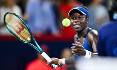 Mboko hits a ball to the fans as she celebrates her semifinal victory to reach her first WTA Tour final.